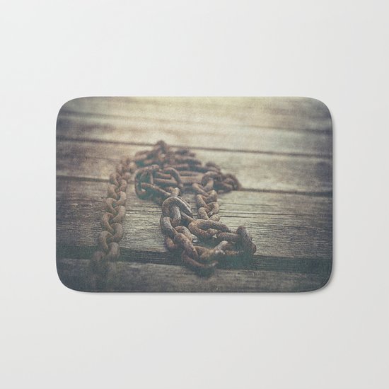 The chained boy Bath Mat