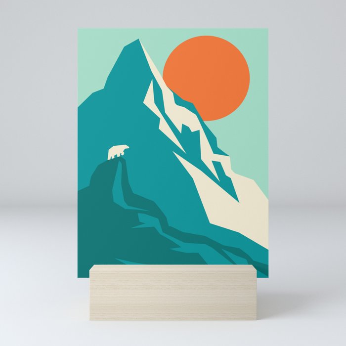 As the sun rises over the peak Mini Art Print