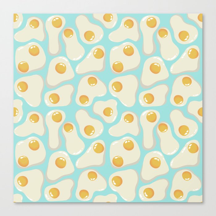 Fried Eggs on blue background Canvas Print