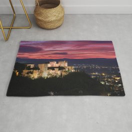 Winter sunset. The Alhambra Palace. Beautiful red clouds at sunset. Area & Throw Rug