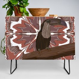 Awesome Toucan sitting on a branch on a red brown patterned background Credenza