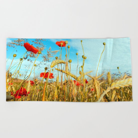 Lying in the cornfield, let your soul Beach Towel