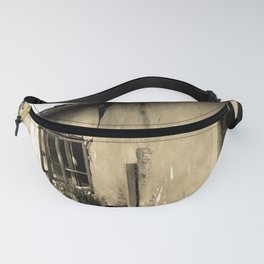 Abandoned old country house with cracks and broken windows, sepia photography Fanny Pack