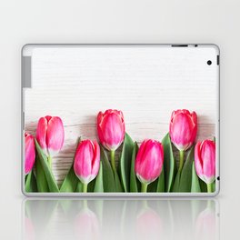 Beautiful pink tulips on wooden background. Laptop & iPad Skin