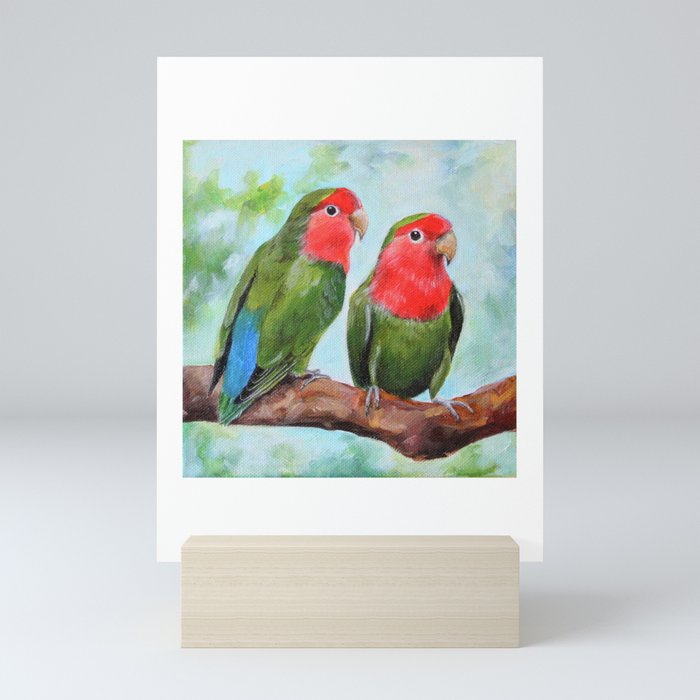Two parrots on a branch Mini Art Print