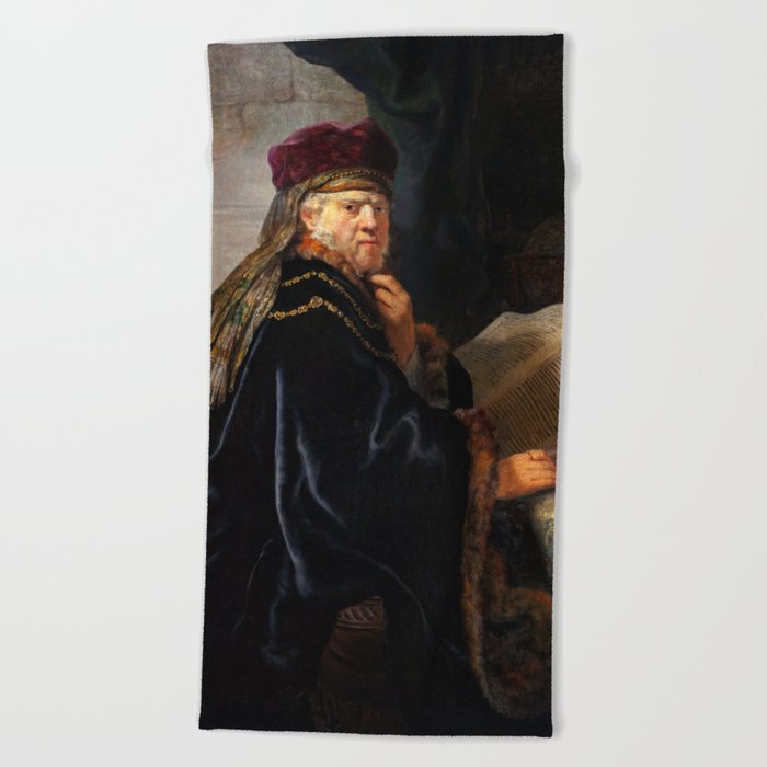 Scholar in His Study, 1634 by Rembrandt  Beach Towel