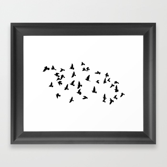 Flock of flying birds Framed Art Print