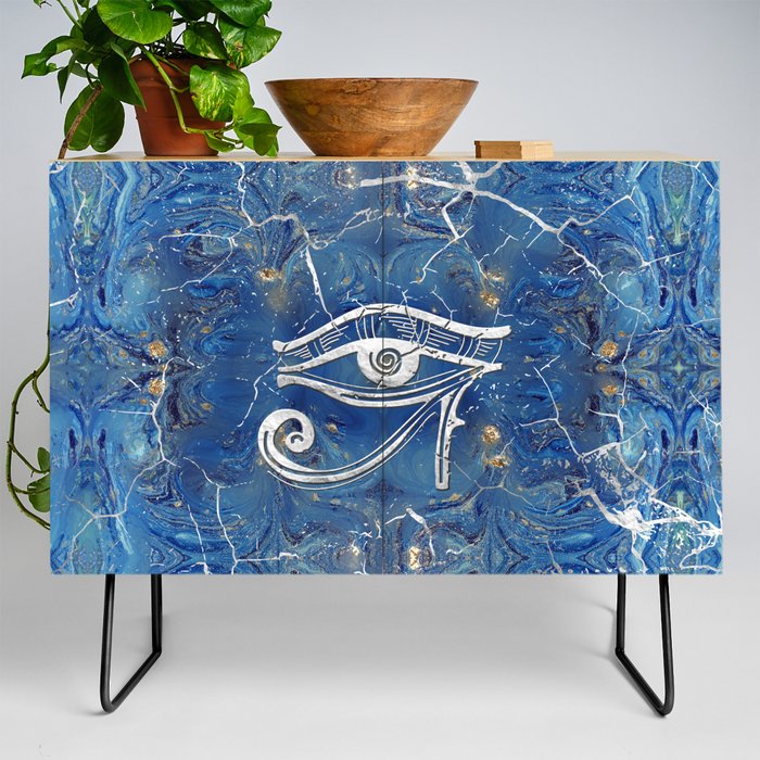 Silver Egyptian Eye of Horus  on blue marble Credenza