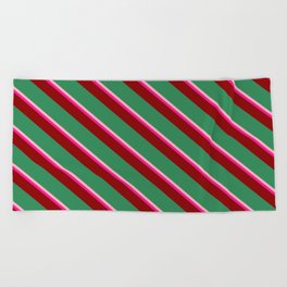 [ Thumbnail: Light Pink, Deep Pink, Dark Red & Sea Green Colored Striped Pattern Beach Towel ]