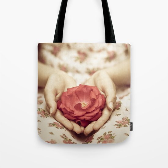 Rose in her hands II Tote Bag