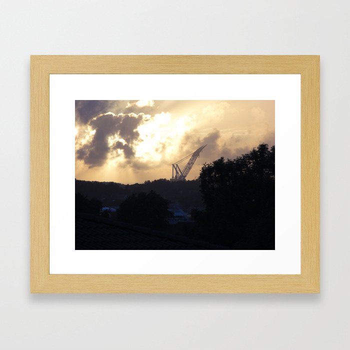 Evening, crazy looking sky. Heavy lift vessel in the distance Framed Art Print