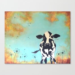 Cow in Dandelion field Canvas Print