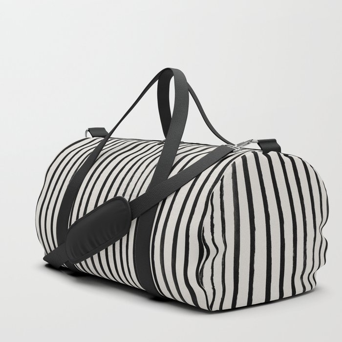 black and white striped duffle bag
