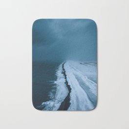 Black Sand Beach with snow in Iceland during a storm – Moody Landscape Photography Bath Mat | Travel, Photo, Beach, Storm, Moody, Minimal, Landscape, Ocean, Dark, Sand 