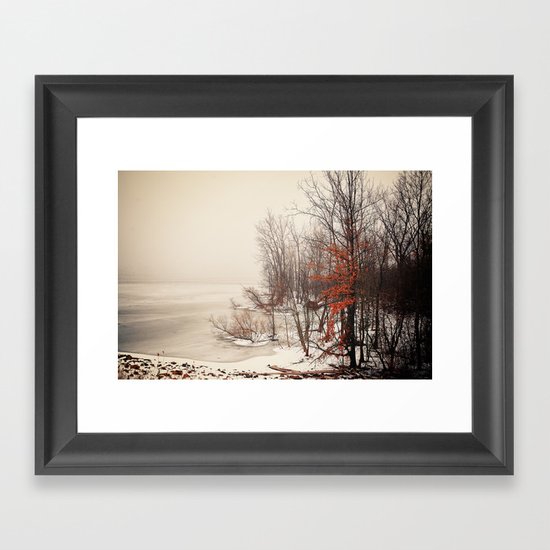On winters frozen pond Framed Art Print