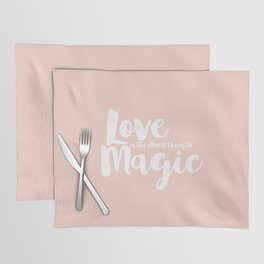 LOVE is the closest think to magic - Saying on peach background Placemat