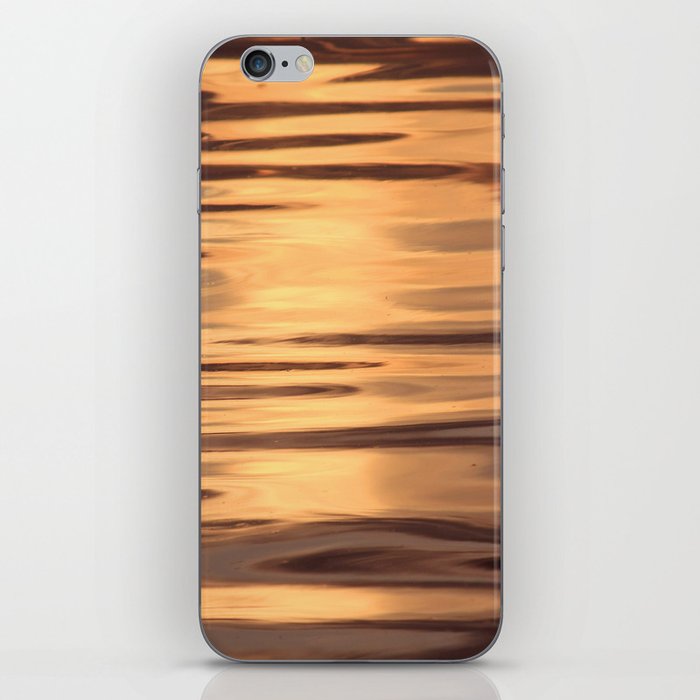 Wavy water in sunset iPhone Skin