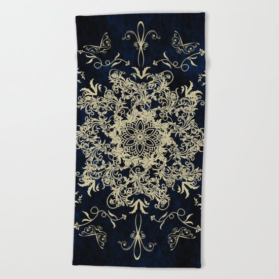 Pale Gold Floral Design On A Blue Textured Background Beach Towel