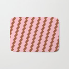 [ Thumbnail: Pink and Sienna Colored Pattern of Stripes Bath Mat ]
