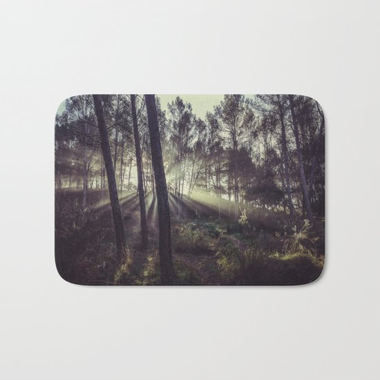 "Forest dreams". Sunrise through the foggy forest Bath Mat