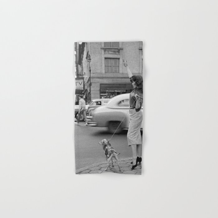 Young woman with pet dog hailing a yellow cab taxi New York City portrait black and white photograph - photography - photographs Hand & Bath Towel