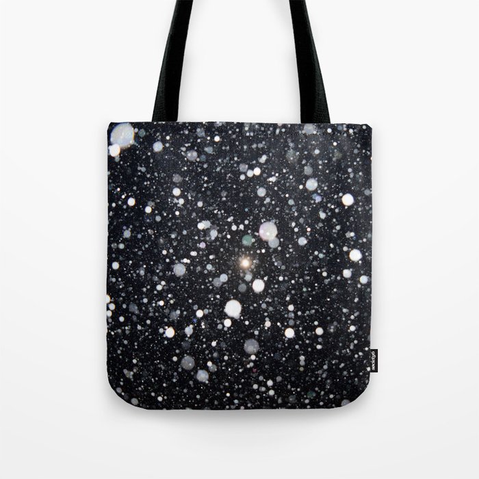 Moon in a snowstorm Tote Bag