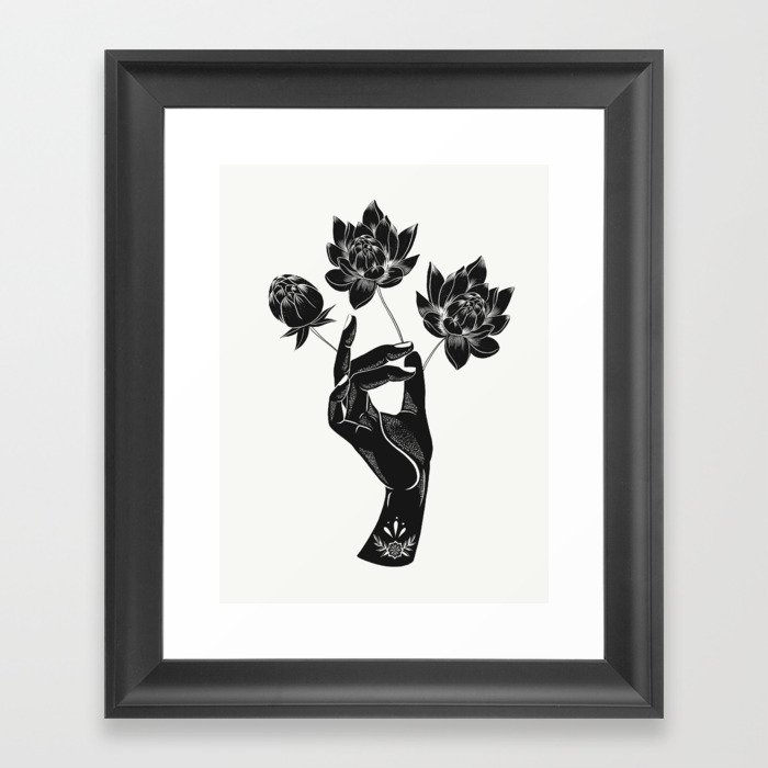 Hand holding lotus flowers  Framed Art Print