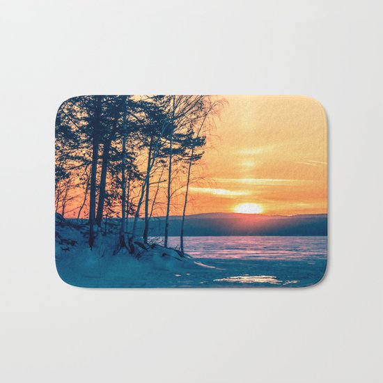 Winter sunset and the sun pillar Bath Mat