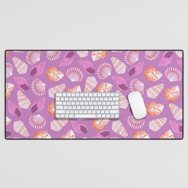 Shell pattern on purple background Desk Mat