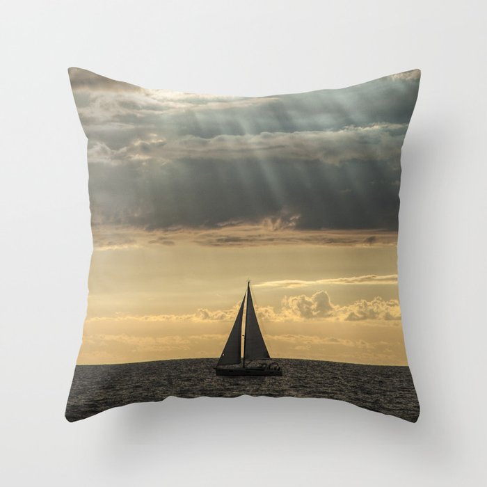 Sailboat Sailing in Lake Michigan beneath Sunbeams Throw Pillow