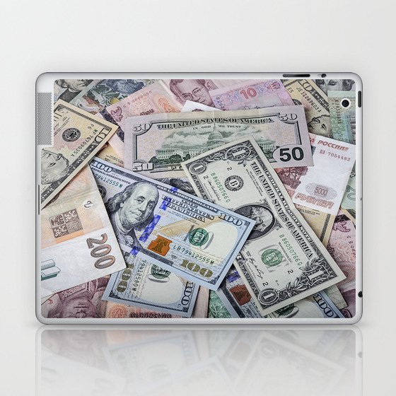 A collection of various foreign currencies Laptop & iPad Skin