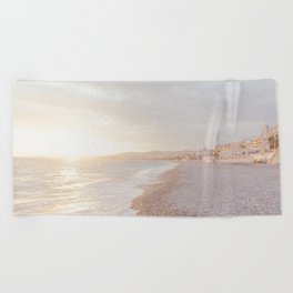 Nice (France) shoreline at sunset Beach Towel