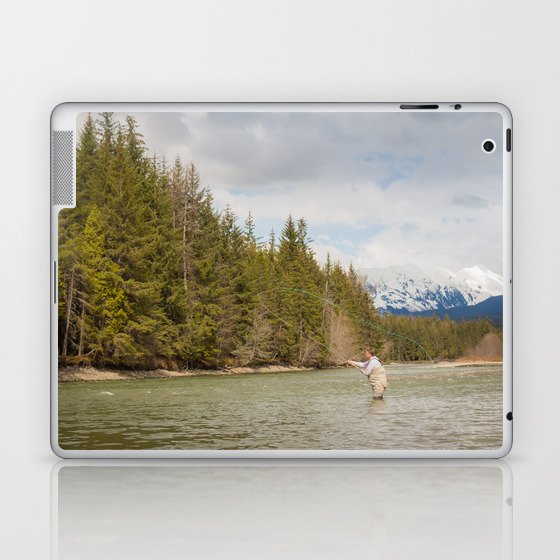 A fly fisherman casting on the Kalum River in the Skeena Region of British Columbia, Canada Laptop & iPad Skin