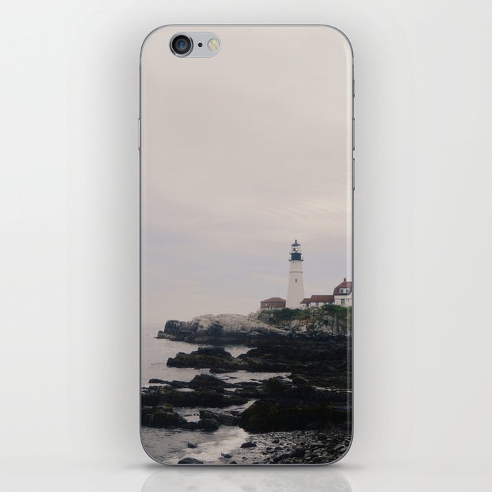 Lighthouse on the coast iPhone Skin