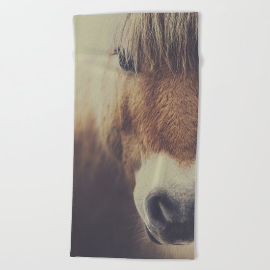 The curious girl Beach Towel