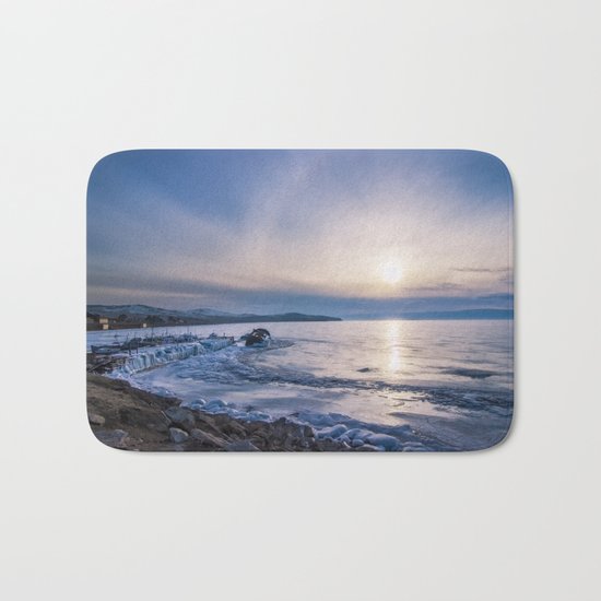 Abandoned ship at frozen wharf Bath Mat