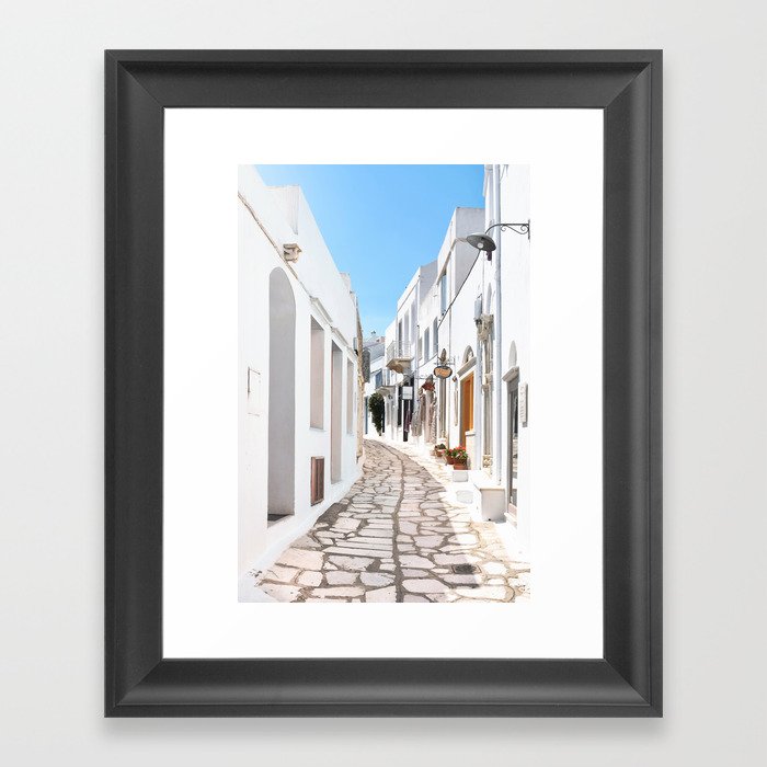 Street View of Tinos Island in Greece with Traditional Houses and Shops Framed Art Print