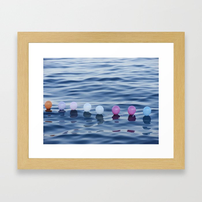 baloon sea Framed Art Print