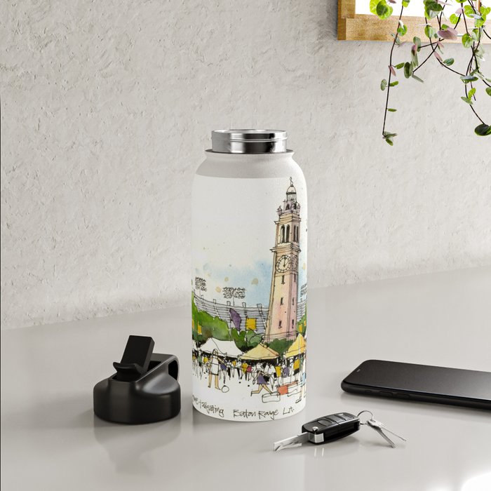 https://ctl.s6img.com/society6/img/9jfrMjdMQo67nsDY5JHwKyILVg8/w_700/water-bottles/32oz/straw-lid/lifestyle/~artwork,fw_3390,fh_2230,fy_-172,iw_3390,ih_2573/s6-0053/a/22772940_5492019/~~/lsu-game-day-tailgaters-water-bottles.jpg