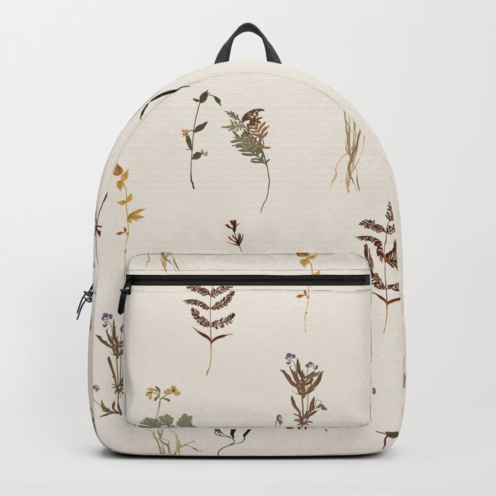 Dried autumn wildflowers. Golden leaves and flowers Backpack
