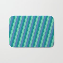[ Thumbnail: Dark Cyan, Aquamarine & Blue Colored Striped Pattern Bath Mat ]