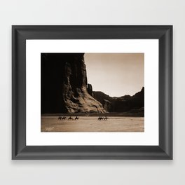 Canyon de Chelly - Chinle, Arizona – Navajo Indians on Horseback by Edward Curtis Framed Art Print