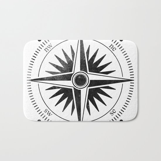 Black Compass on White Bath Mat