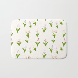 Tiny flowers in bloom Bath Mat