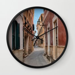 Narrow street in Ciutadella with old houses - Menorca, Spain Wall Clock