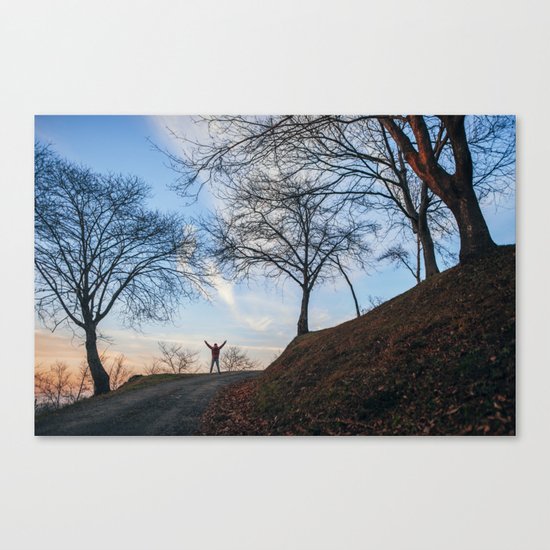 Silhouette at sunset Canvas Print