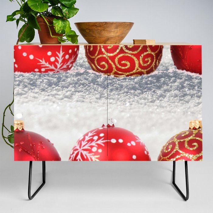 Red and Gold Christmas Ornaments In The Snow  Credenza