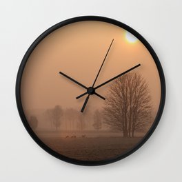 Early morning in a clearing Wall Clock