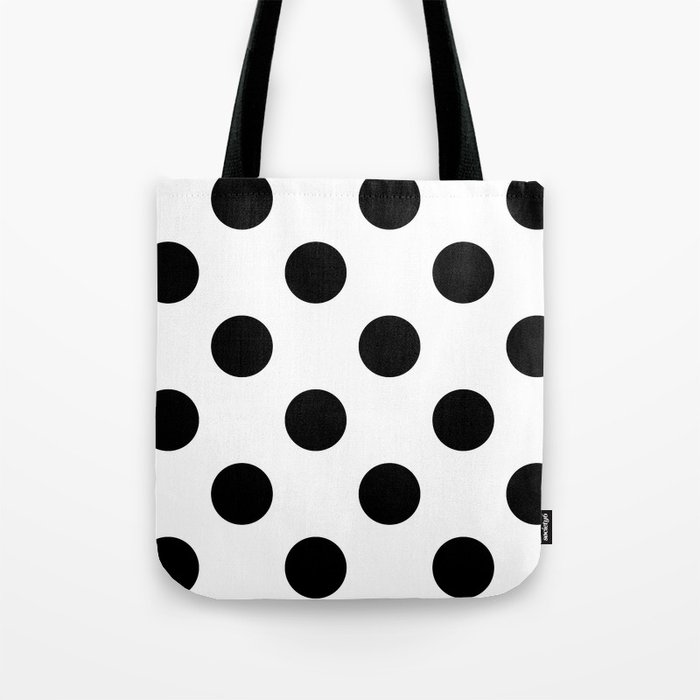 black and white polka dot luggage