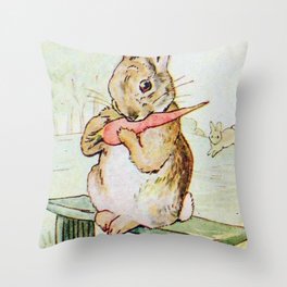 Peter Rabbit eating his carrot by Beatrix Potter Throw Pillow